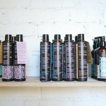 hair products in their containers on shelves